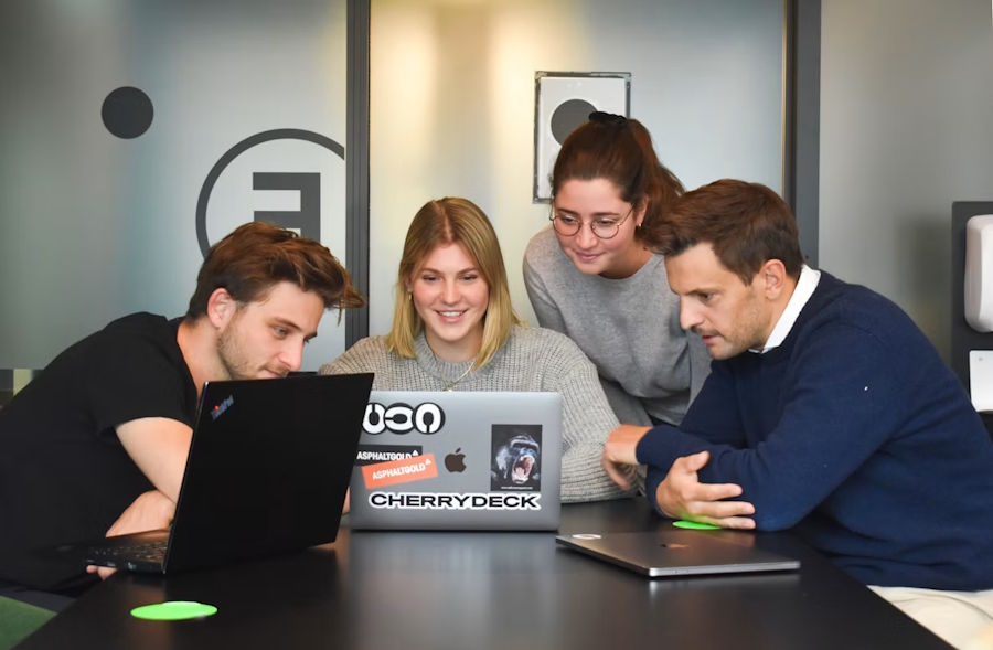 A team discussing the extent of a chatbot for a website